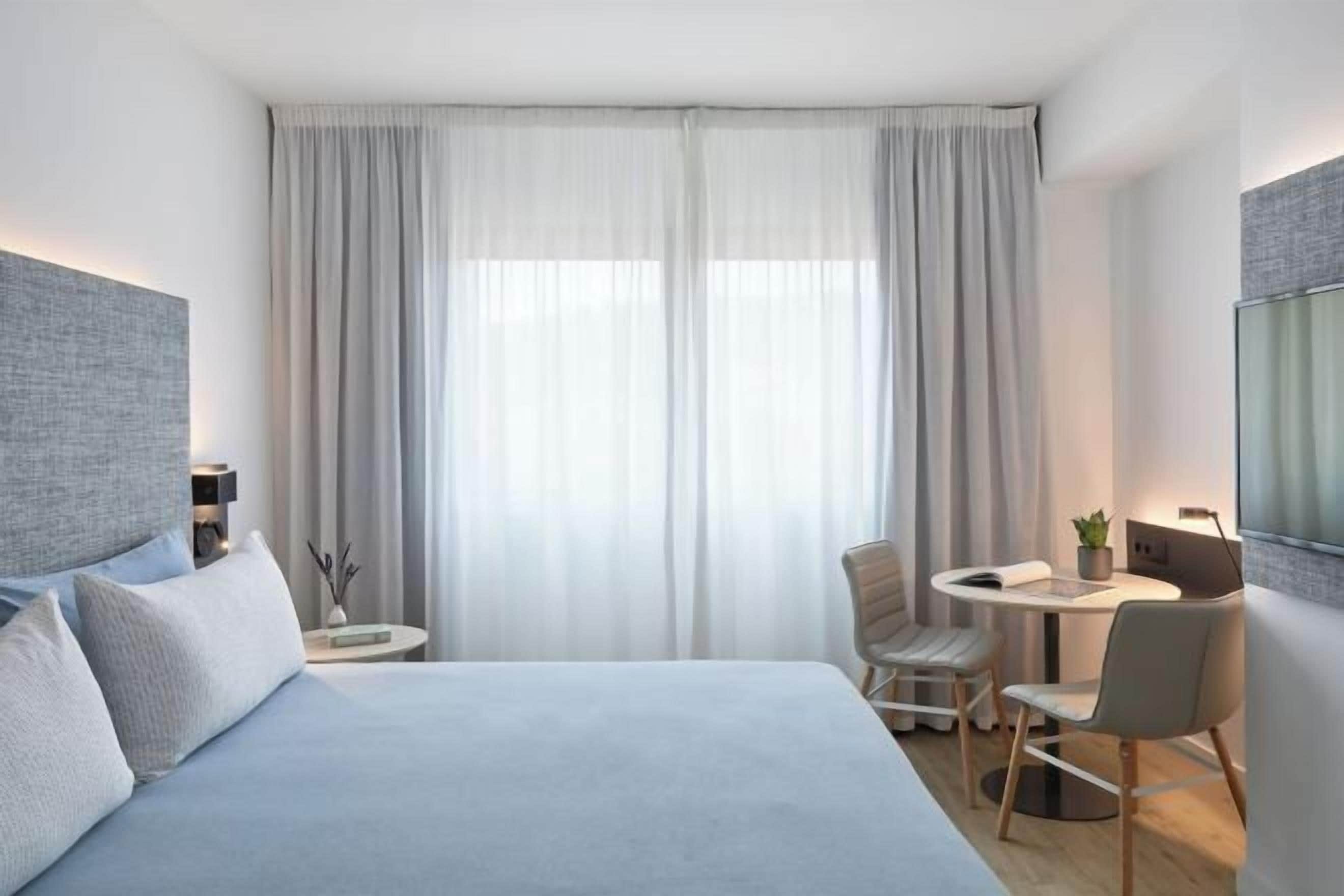 Premium bedding, down comforters, minibar, in-room safe