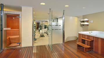 Relax in a serene space with a hot tub, sauna, and access to a gym.
