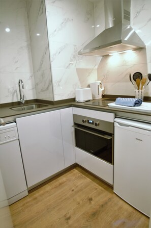 Apartment, 2 Bedrooms | Private kitchen | Fridge, microwave, oven, dishwasher
