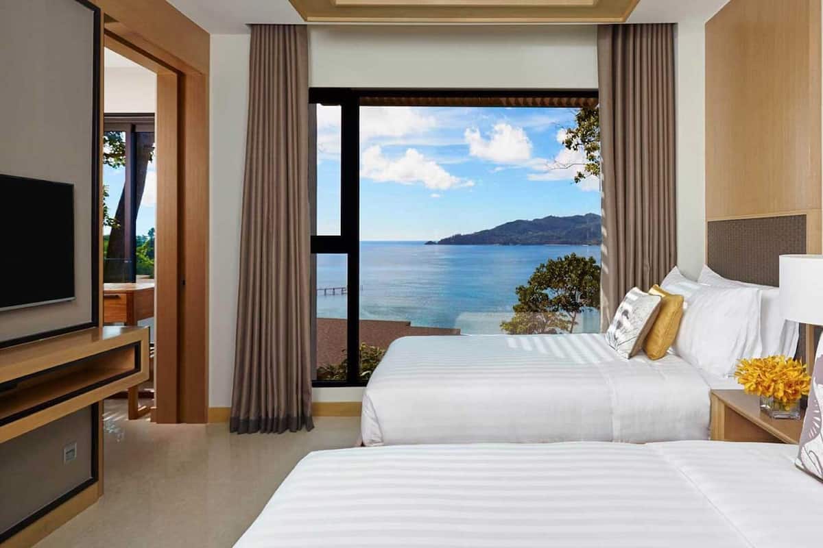 Suite, 2 Bedrooms (Ocean Coral Lounge) | Minibar, in-room safe, desk, laptop workspace