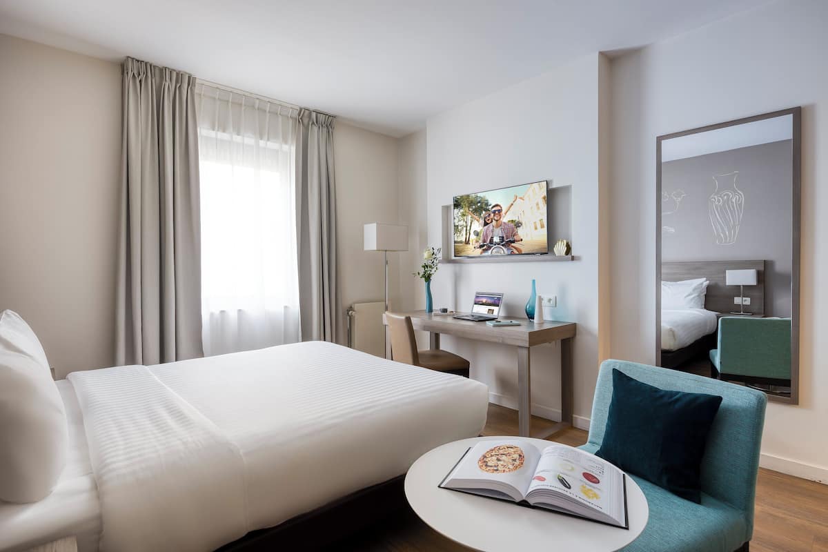 Studio | In-room safe, individually decorated, desk, blackout curtains