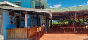 Breakfast, lunch, dinner served; Caribbean cuisine, beach views 