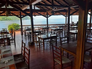 Breakfast, lunch, dinner served; Caribbean cuisine, beach views