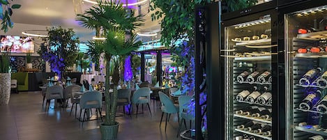 Breakfast, lunch, dinner served; international cuisine, garden views