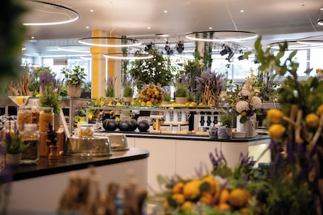 Breakfast, lunch, dinner served; international cuisine, garden views