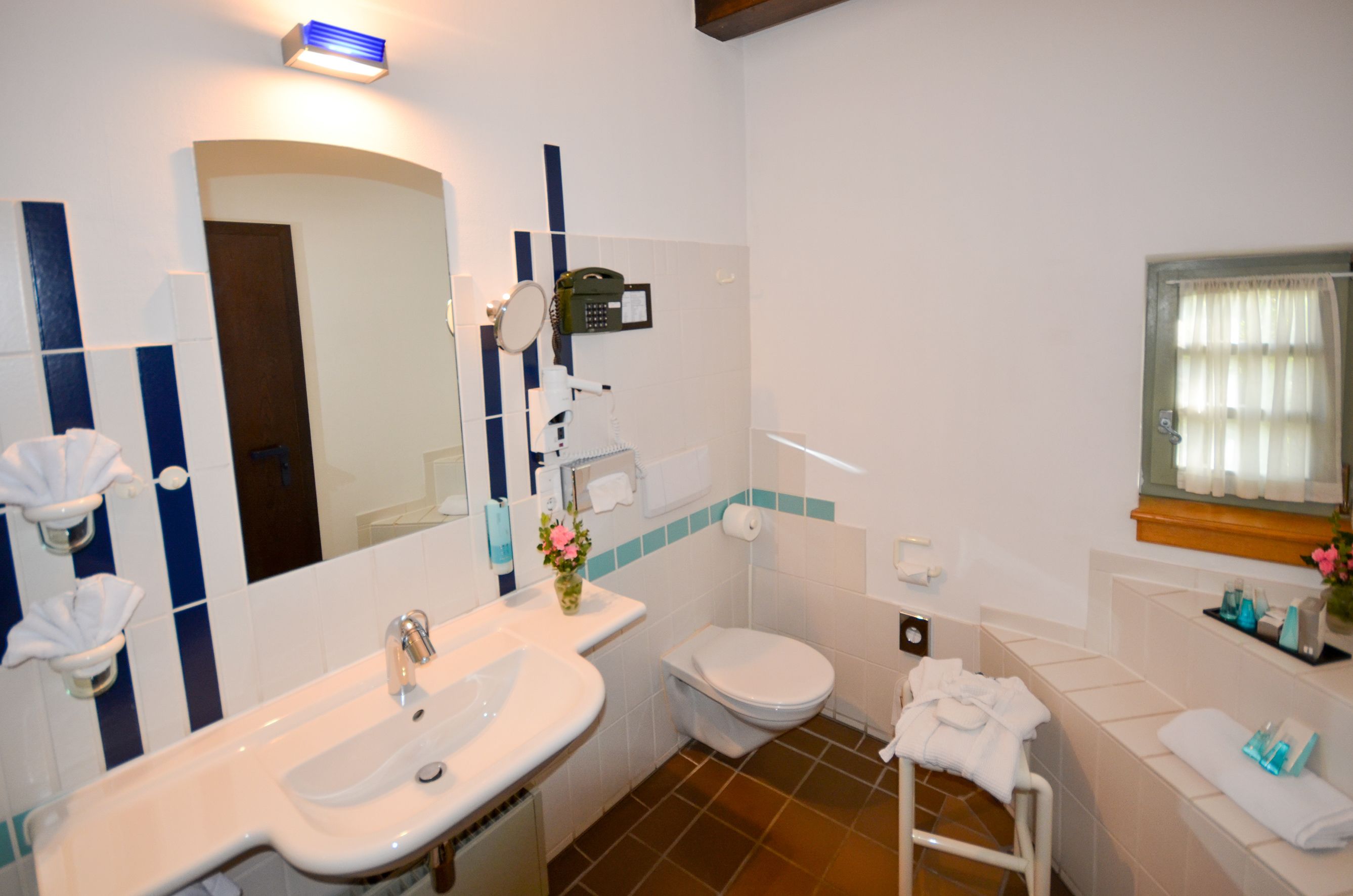 free toiletries, hair dryer, bathrobes, slippers