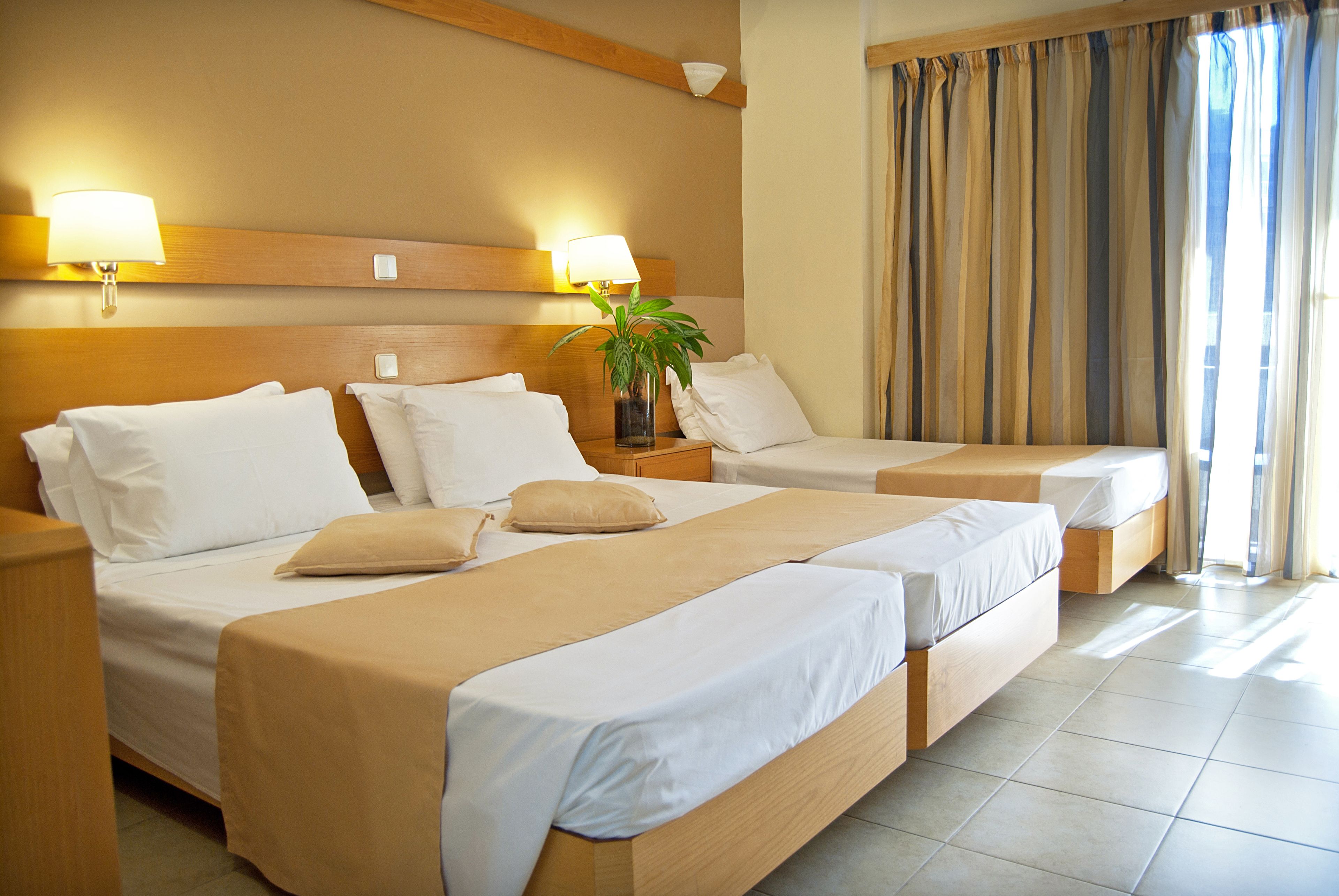 family triple room, city view | 1 bedroom, in-room safe, free wifi, bed sheets