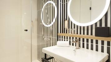 Eco-friendly toiletries, hair dryer, towels, soap