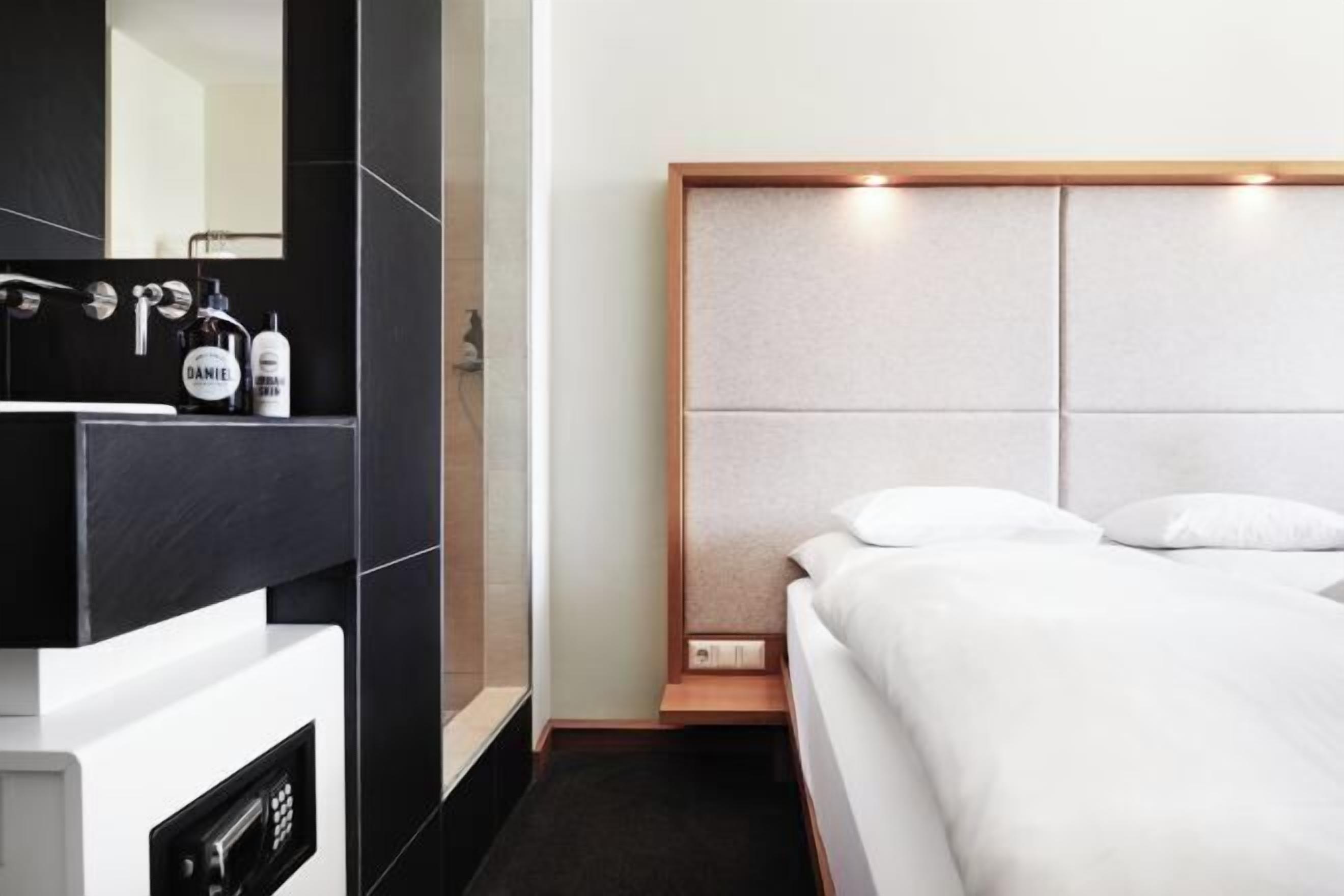 Bathroom | Shower, rainfall showerhead, hair dryer, towels