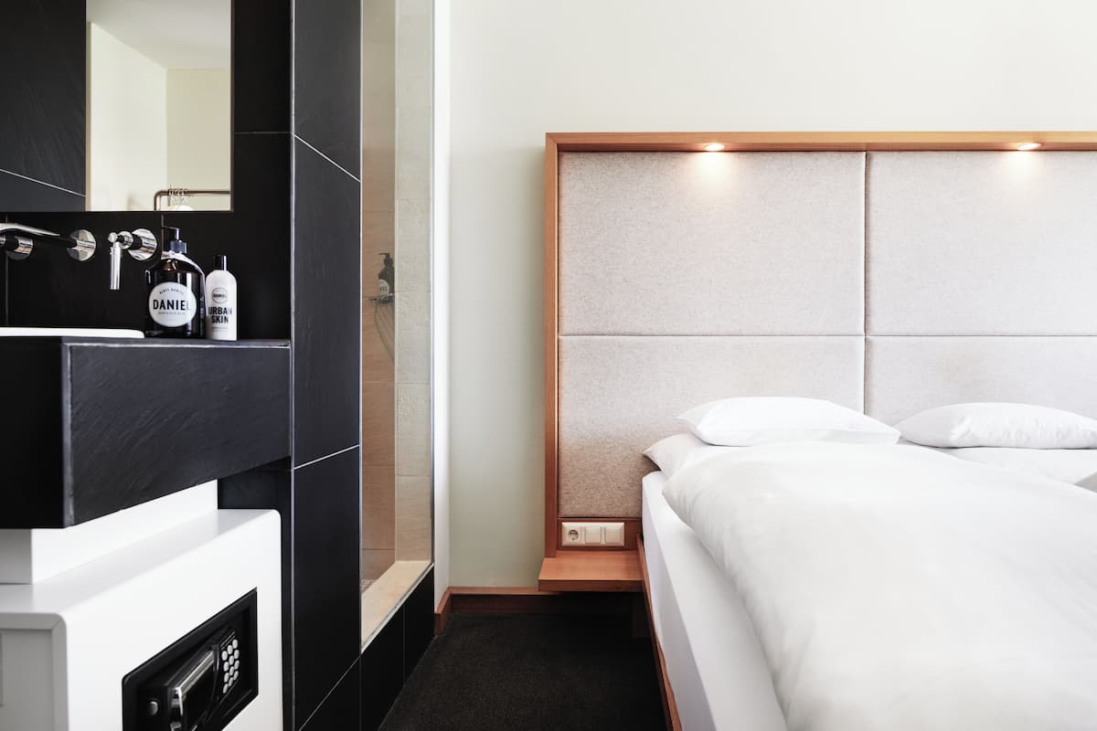 Hypo-allergenic bedding, in-room safe, desk, soundproofing