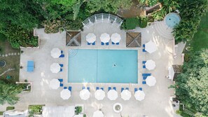 Outdoor pool, free cabanas, pool umbrellas