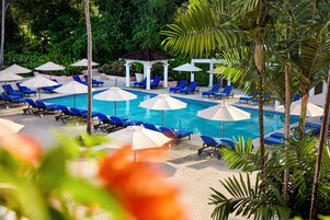 Outdoor pool, free cabanas, pool umbrellas