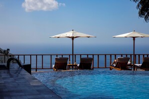 Outdoor pool, pool umbrellas, pool loungers
