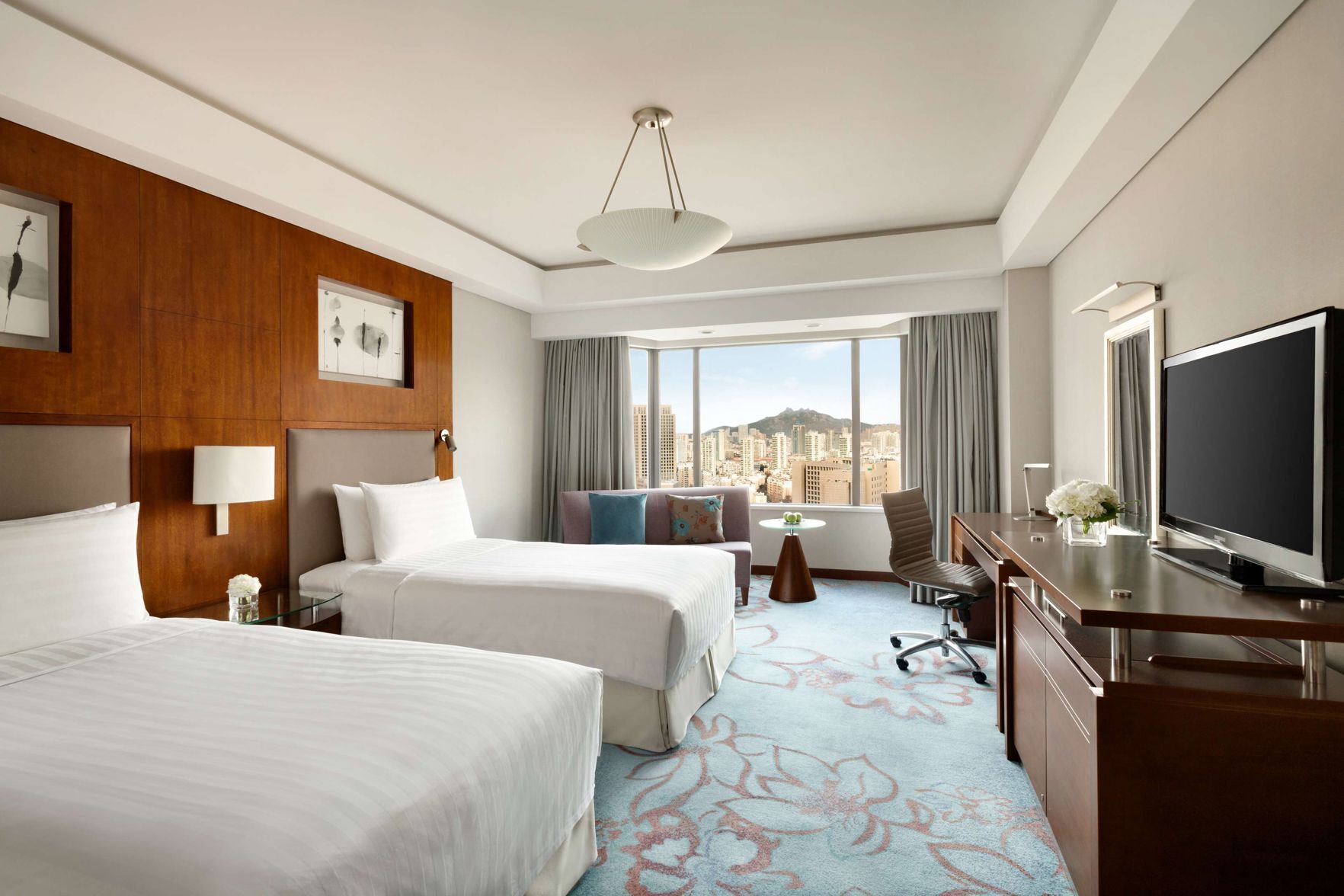 Premium bedding, down comforters, minibar, in-room safe
