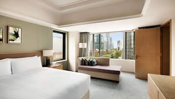Suite ejecutiva | Ropa de cama de alta calidad, edredón y minibar