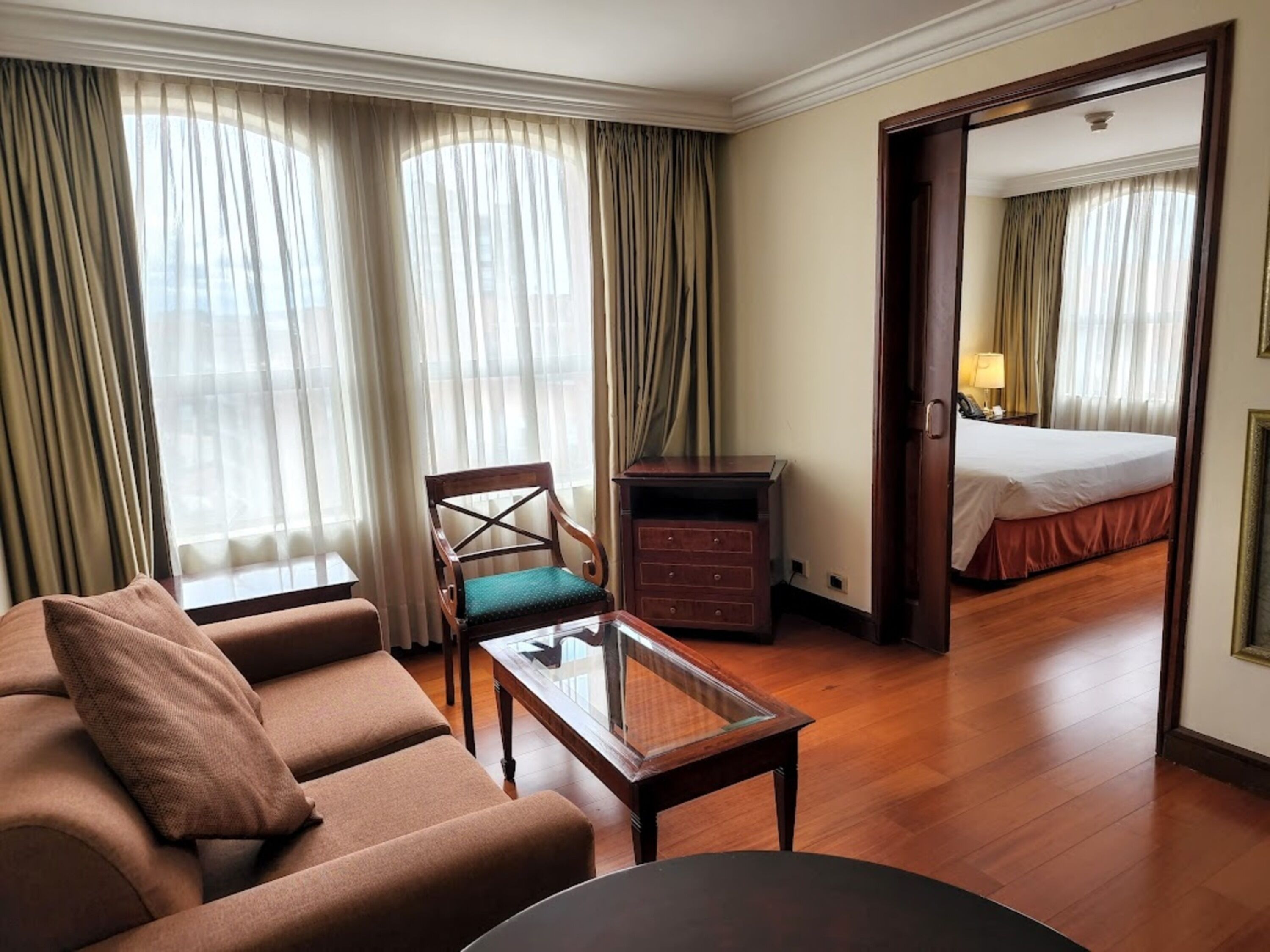 junior suite deluxe | living area | 35-inch lcd tv with cable channels, tv