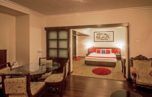 Suite, 1 King Bed, Smoking | In-room safe, desk, blackout curtains, iron/ironing board