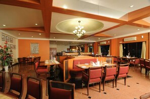 2 restaurants; breakfast, lunch, and dinner served - Quality Inn Regency (Nashik)
