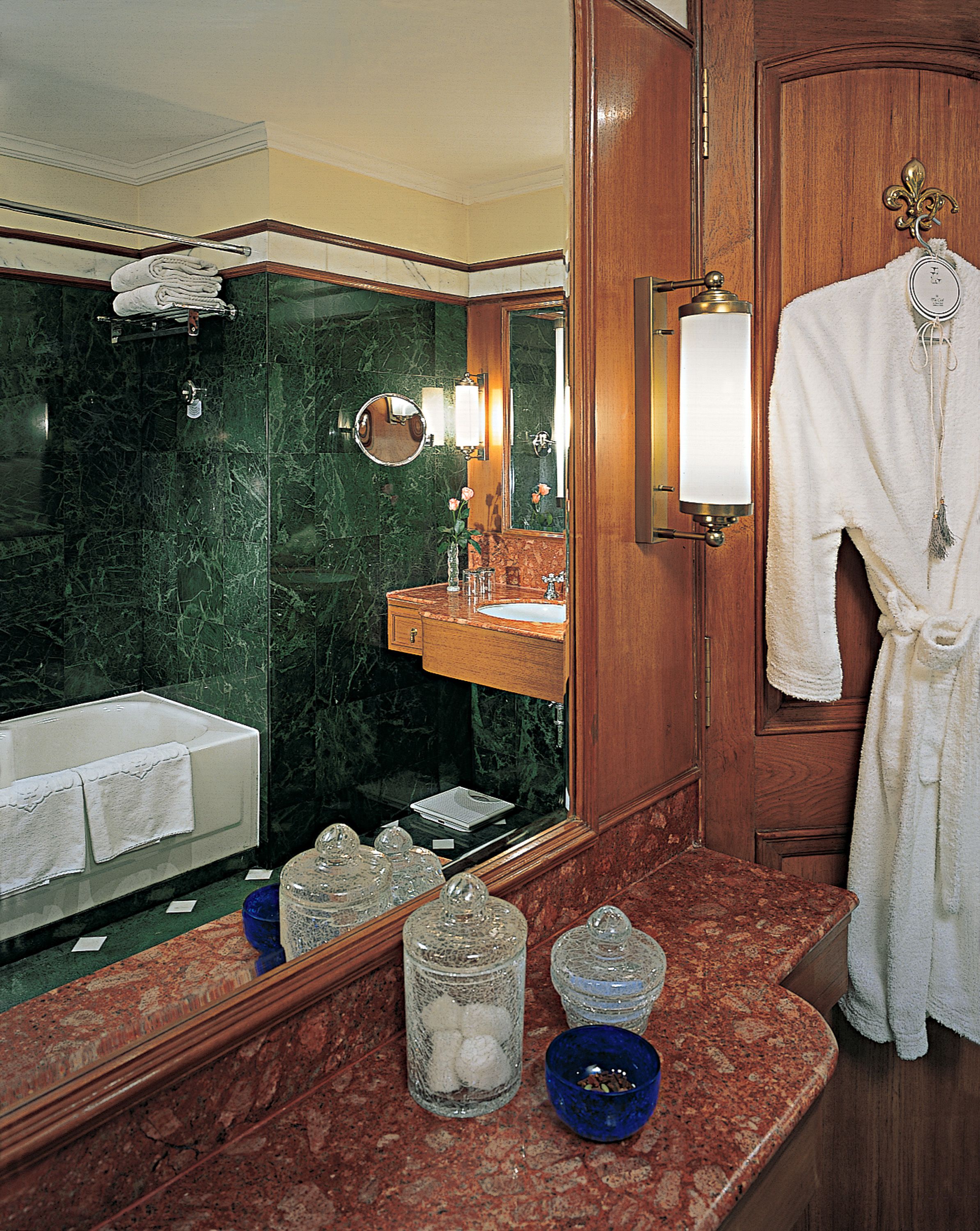 combined shower/bathtub, deep-soaking bathtub, designer toiletries