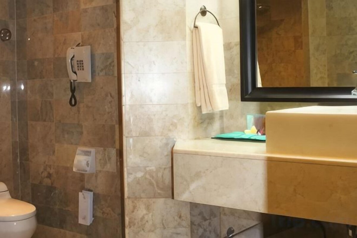 Shower, rainfall showerhead, eco-friendly toiletries, hair dryer