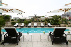 Outdoor pool, sun loungers