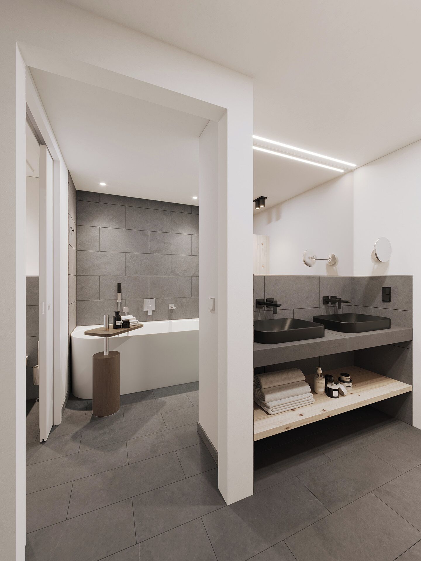 A modern bathroom with a bathtub, two sinks, and a vanity with shelves.