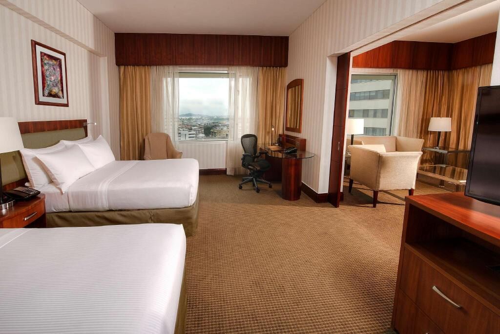 Hypo-allergenic bedding, minibar, in-room safe, desk