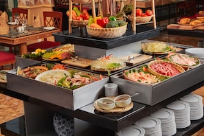 Daily buffet breakfast (USD 20 per person)