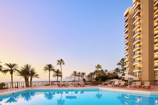2 outdoor pools, pool umbrellas, pool loungers