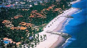 On the beach, sun loungers, beach umbrellas, beach towels