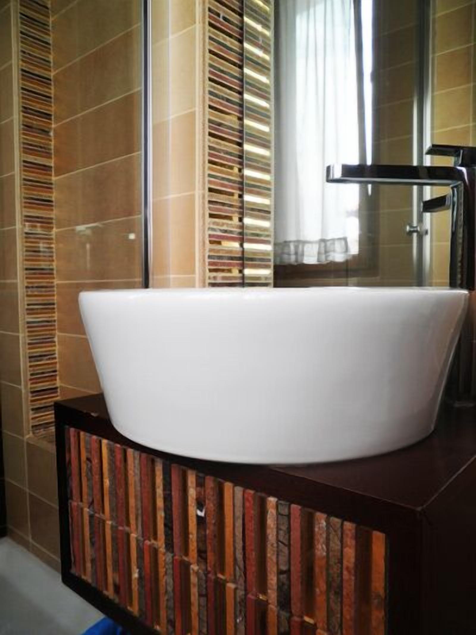 triple room | bathroom sink