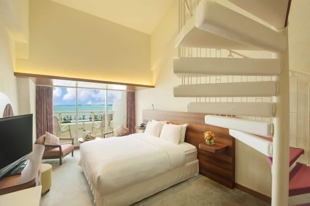 Premium bedding, down duvets, pillow-top beds, in-room safe