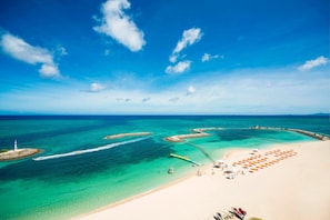 Private beach, white sand, beach cabanas, beach umbrellas