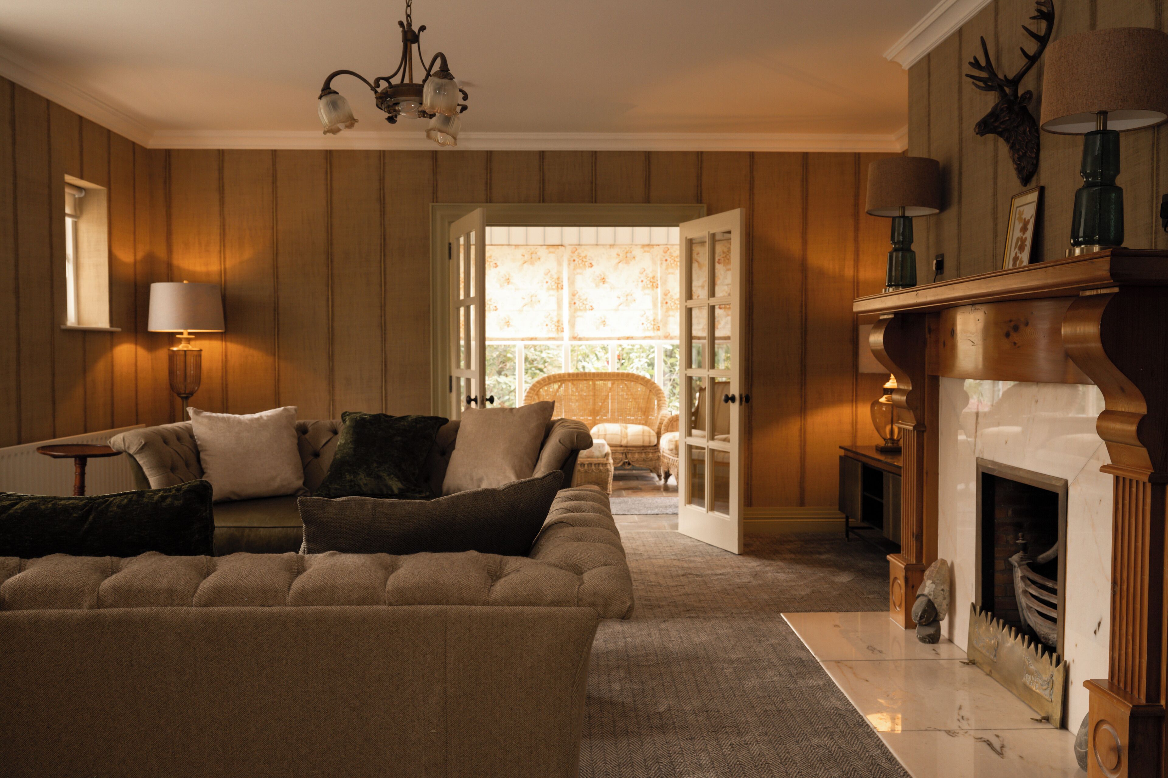 the oaks residence | living area | flat-screen tv, fireplace