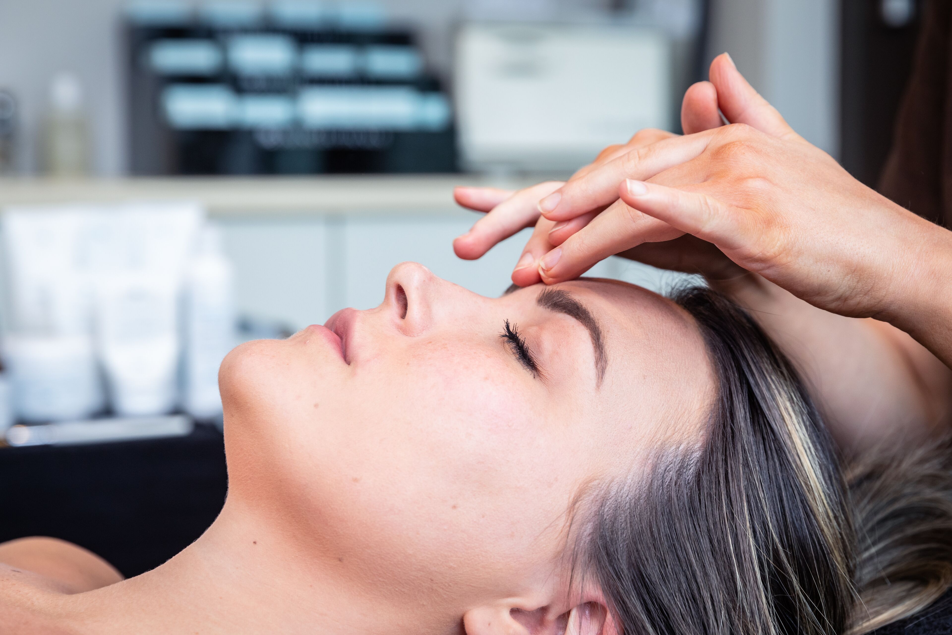 A person receiving a facial treatment.