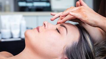A person receiving a facial treatment.