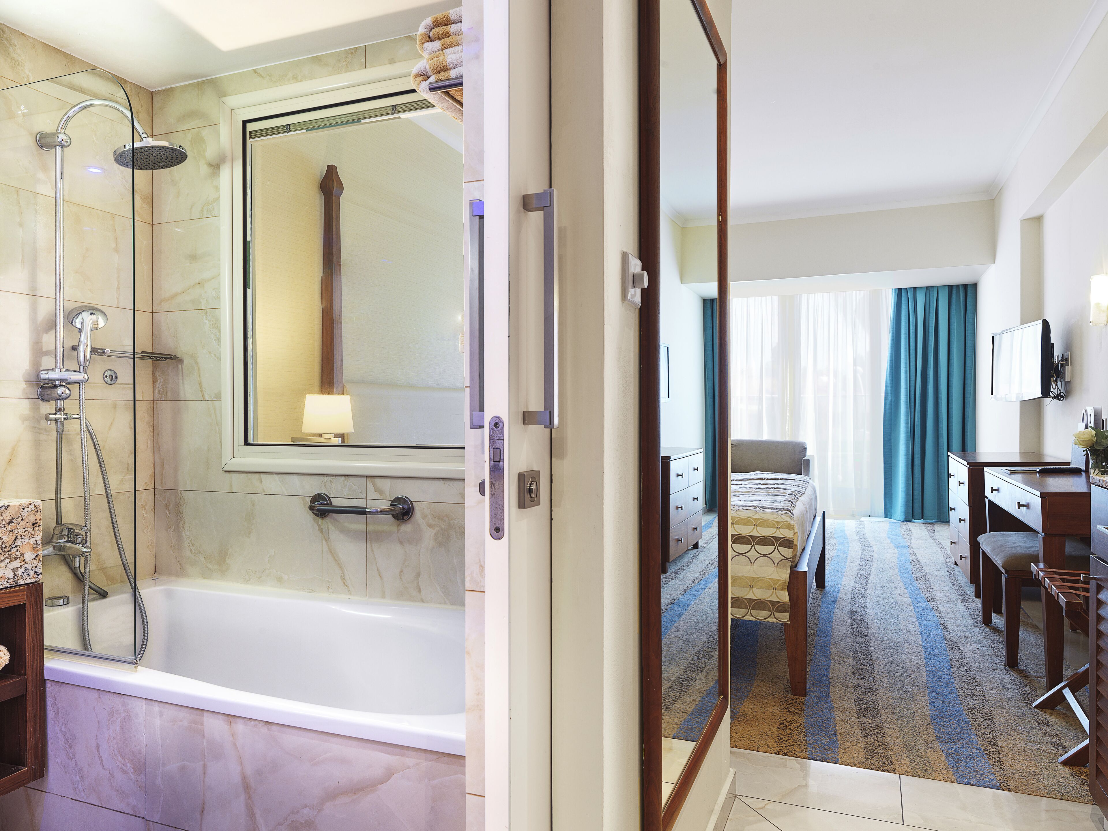 combined shower/bathtub, free toiletries, hair dryer, slippers