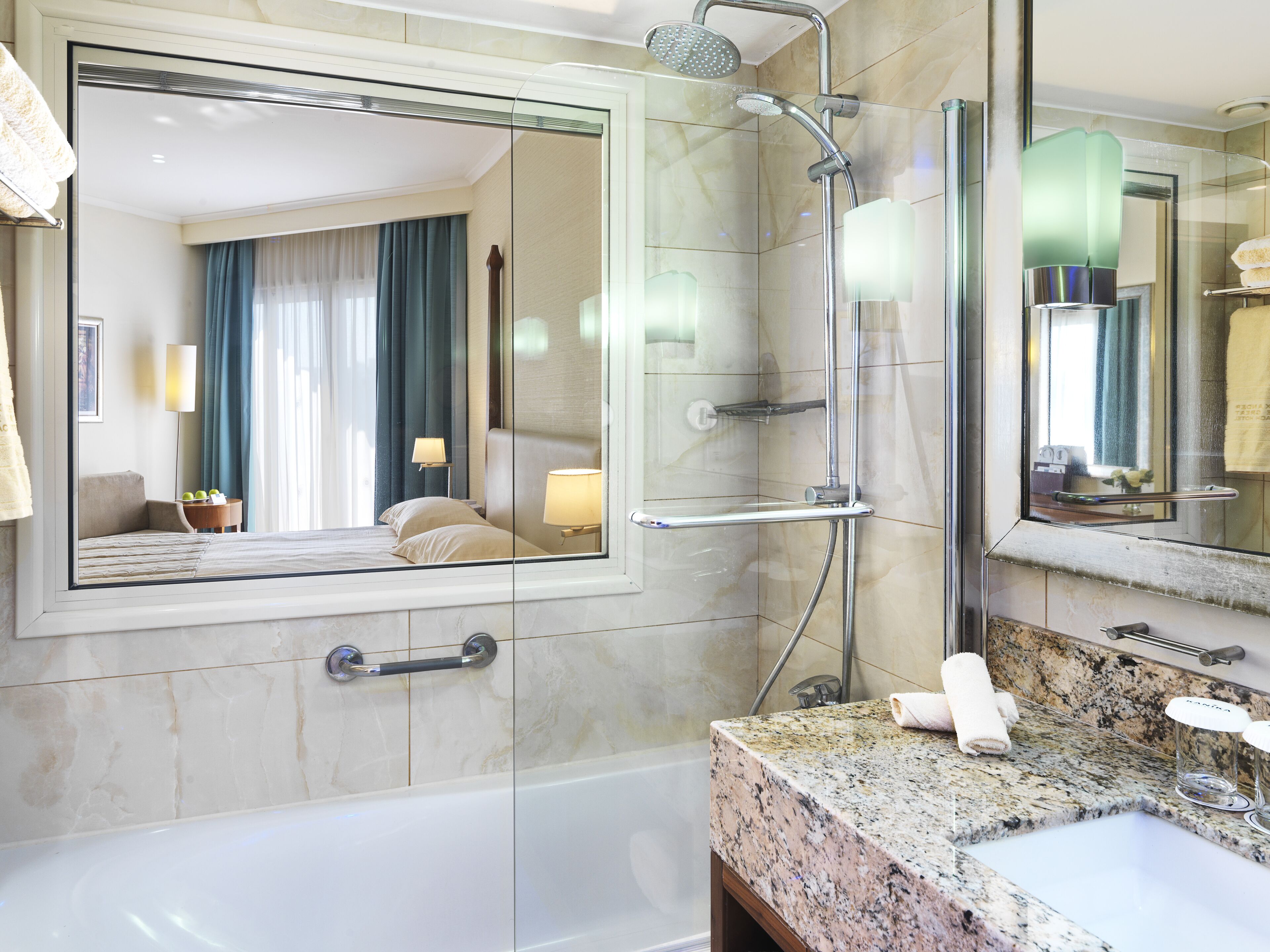 combined shower/bathtub, free toiletries, hair dryer, slippers