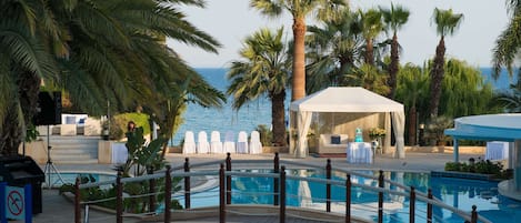 Indoor pool, outdoor pool, pool umbrellas, pool loungers