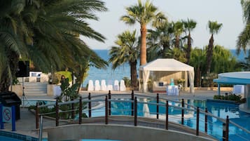 Indoor pool, outdoor pool, pool umbrellas, sun loungers