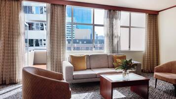 Two Bedroom Apartment with Balcony | Living area | 42-inch LCD TV with cable channels, TV, DVD player