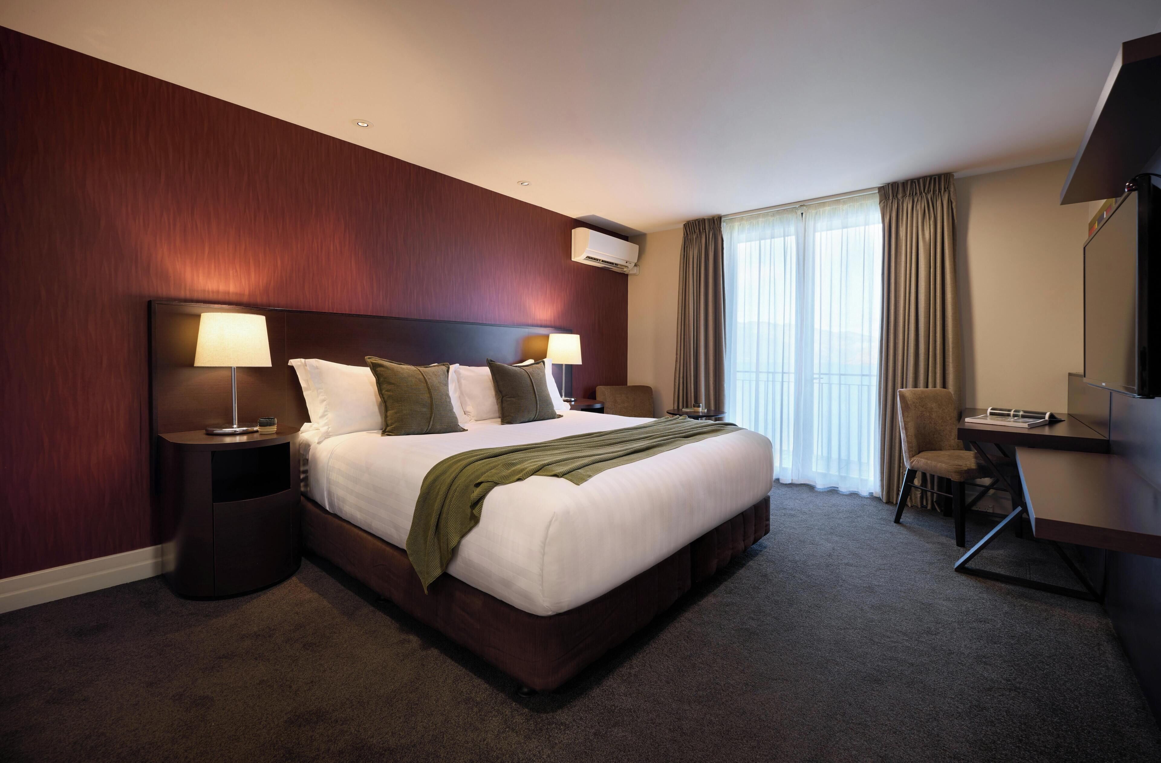 In-room safe, desk, blackout curtains, iron/ironing board