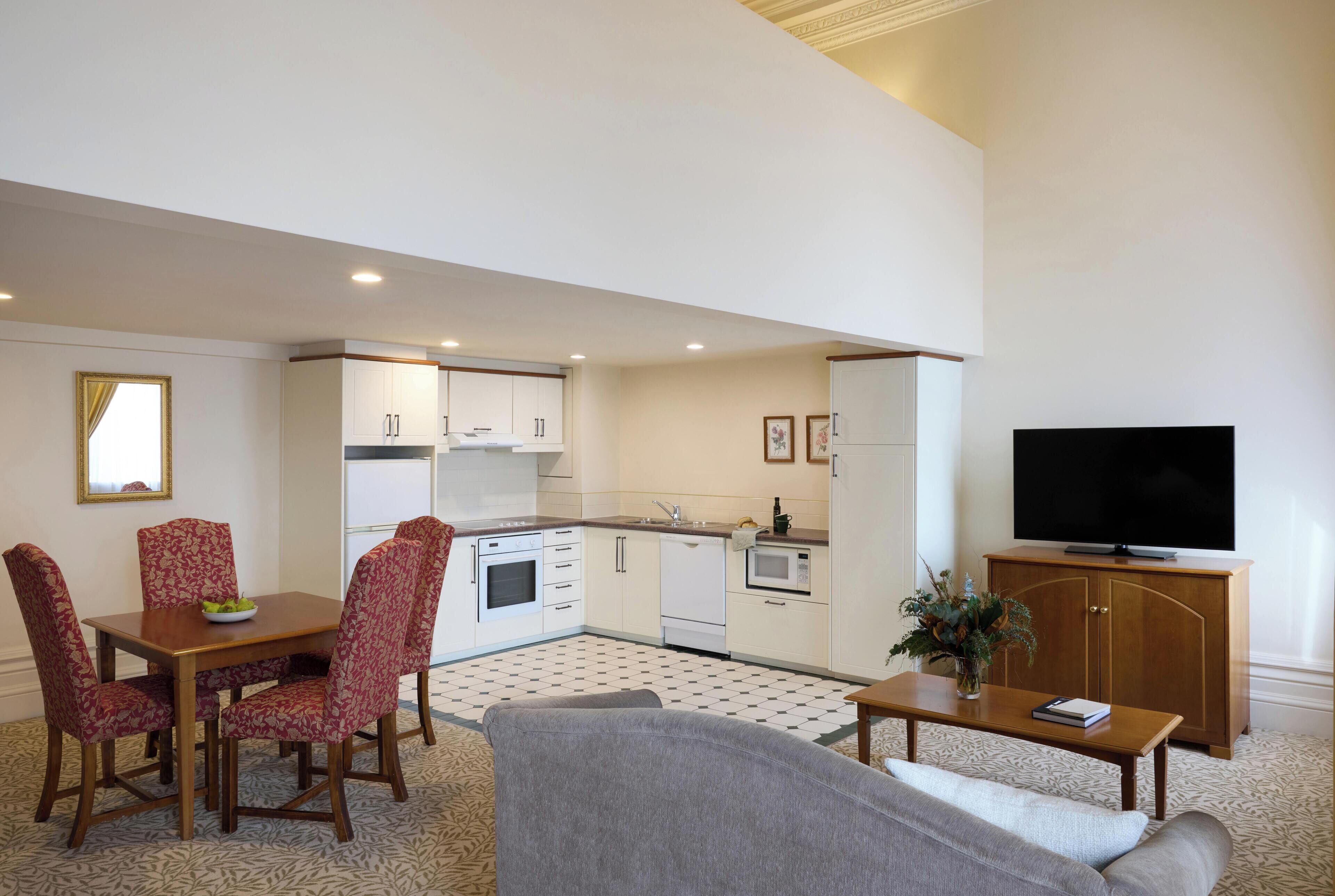 Suite, 1 Bedroom | Private kitchen | Full-sized fridge, microwave, stovetop, coffee/tea maker