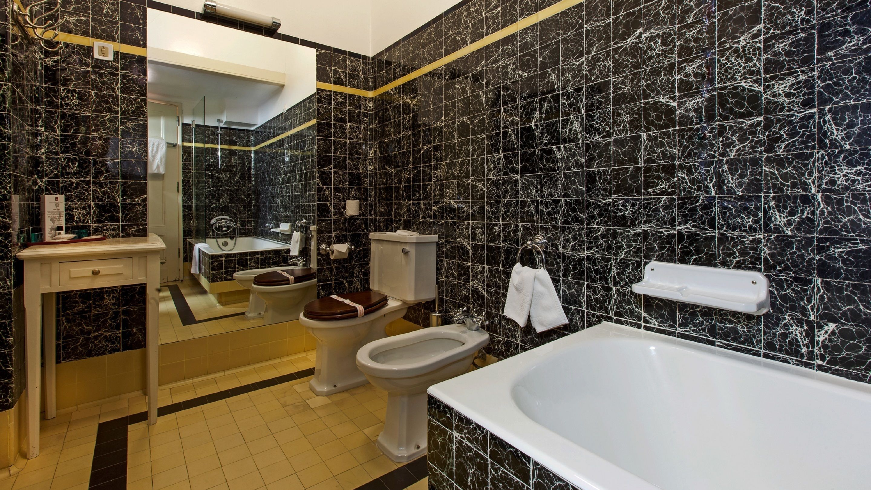 combined shower/bathtub, free toiletries, hair dryer, dressing gowns