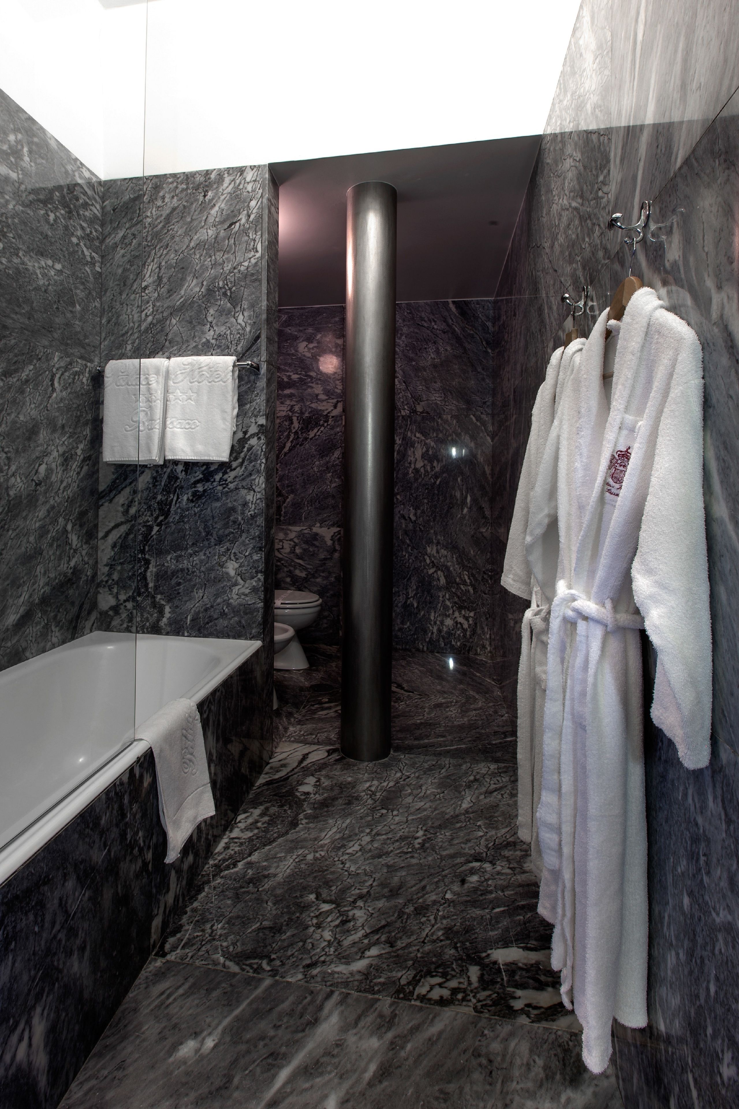 junior suite, 1 double bed | bathroom | combined shower/bathtub, free toiletries, hair dryer, dressing gowns