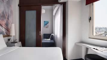 Superior Triple Room, City View | Minibar, in-room safe, laptop workspace, soundproofing
