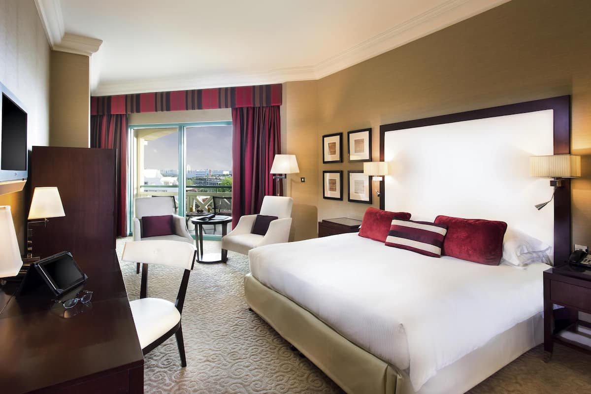 Premium bedding, down comforters, minibar, in-room safe