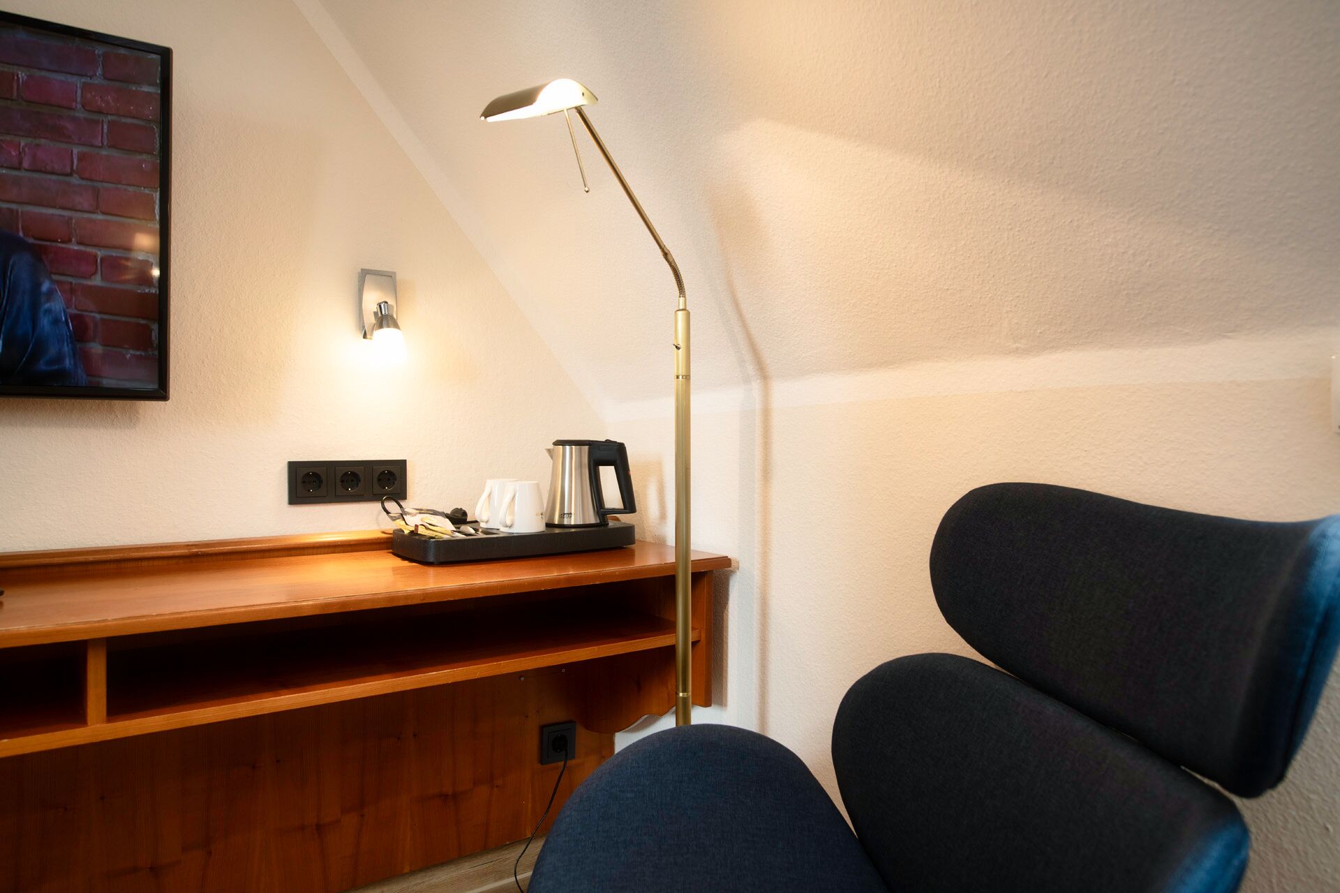 standard double room | living area | 85-cm flat-screen tv with satellite channels, tv