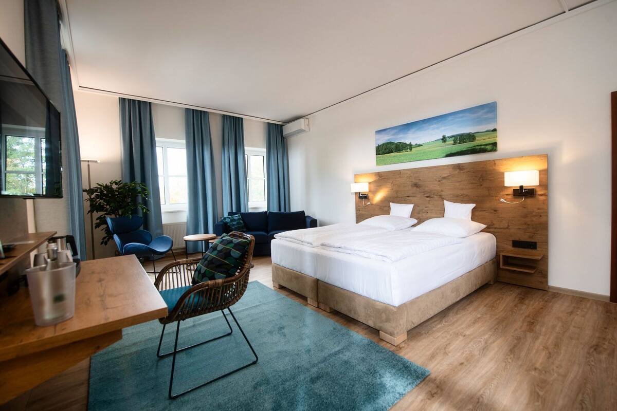Chambre Double Deluxe | Coin séjour