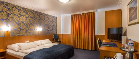 Ropa de cama de alta calidad, camas con pillow-top y minibar
